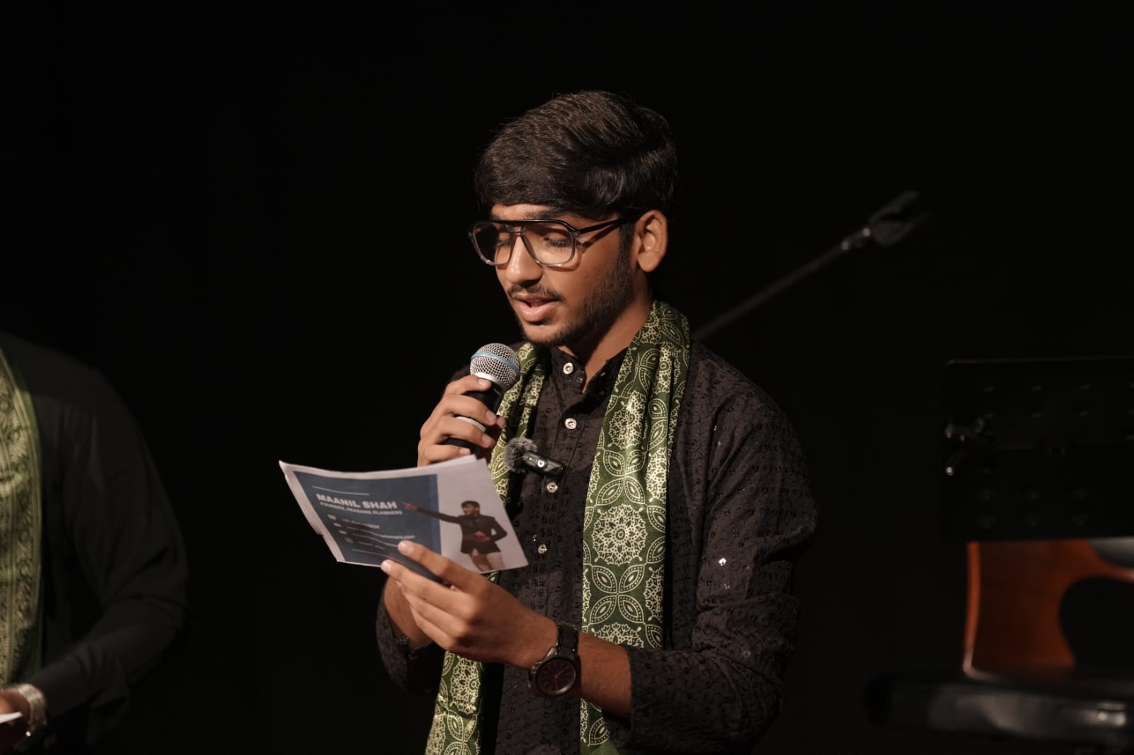 Master of ceremonies addressing audience